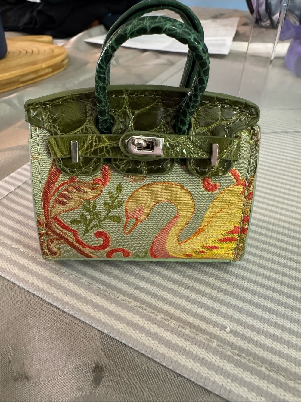 Miniature hand made purse with silk swan and design and leather on bag handle.